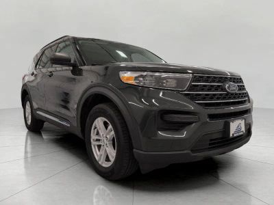 2023 Ford Explorer XLT 4WD in Forged Green Metallic — front three-quarter view