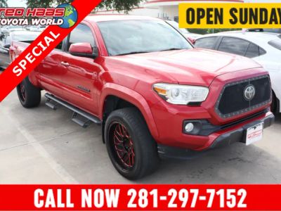 2019 Toyota Tacoma 2WD SR5 in Red — front three-quarter view