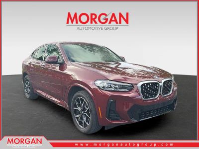 2025 BMW X4 xDrive30i in Red — front three-quarter view
