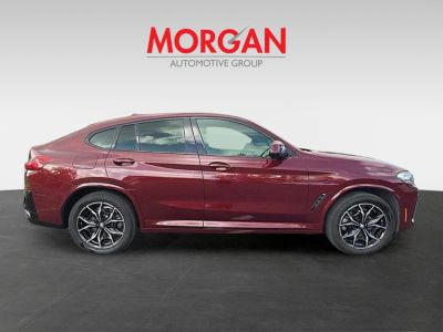 2025 BMW X4 — rear three-quarter view