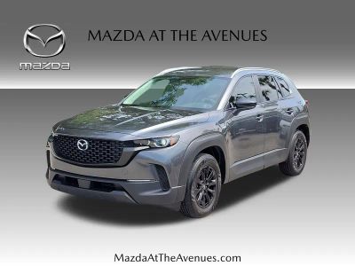 2025 Mazda CX-50 Hybrid Preferred in Gray — front three-quarter view
