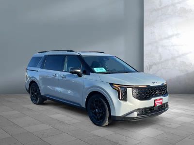 2026 Kia Carnival Hybrid — front three-quarter view