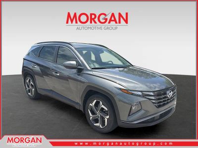 2023 Hyundai Tucson SEL in Amazon Gray — front three-quarter view