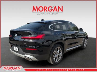 2022 BMW X4 — rear three-quarter view