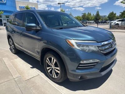2016 Honda Pilot — rear three-quarter view