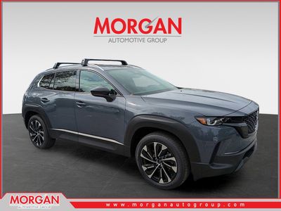 2026 Mazda CX-50 Hybrid Premium Plus in Gray — front three-quarter view