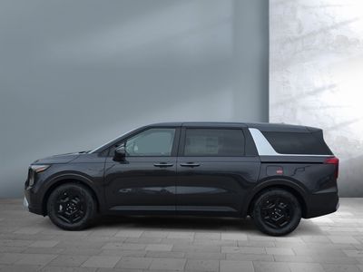 2026 Kia Carnival — rear three-quarter view