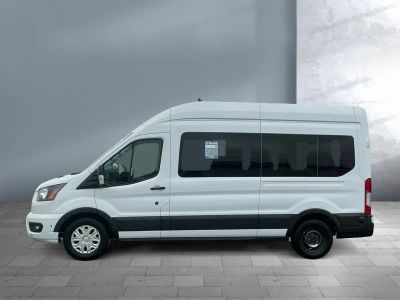 2024 Ford Transit Passenger Wagon — rear three-quarter view