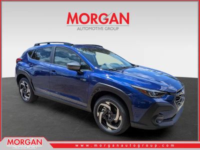 2026 Subaru Crosstrek Limited Hybrid in Sapphire Blue Pearl — front three-quarter view