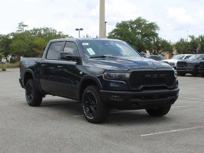 2026 RAM 1500 Rebel in Forged Blue Metallic Exterior Paint — front three-quarter view