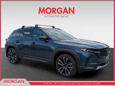 2026 Mazda CX-50 2.5 Turbo Premium Plus in Ingot Blue Metallic — front three-quarter view