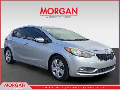 2016 Kia Forte 5-Door LX in Silky Silver — front three-quarter view
