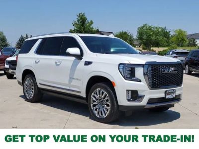 2024 GMC Yukon Denali Ultimate in White Frost Tricoat — front three-quarter view