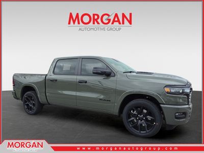 2026 Ram 1500 Laramie in Green — front three-quarter view