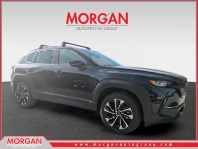2026 Mazda CX-50 Hybrid Premium Plus in Jet Black Mica — front three-quarter view