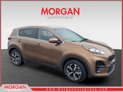 2021 Kia Sportage LX in Brown — front three-quarter view