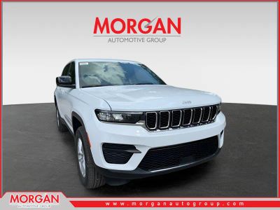 2026 Jeep Grand Cherokee Laredo in Bright White Clearcoat — front three-quarter view