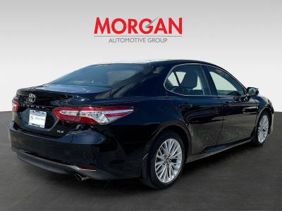 2018 Toyota Camry — rear three-quarter view