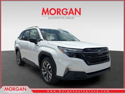 2026 Subaru Forester Touring Hybrid in Crystal White Pearl — front three-quarter view