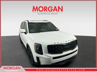 2022 Kia Telluride SX in Glacial White Pearl — front three-quarter view