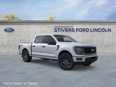 2026 Ford F-150 STX in Iconic Silver Metallic — front three-quarter view