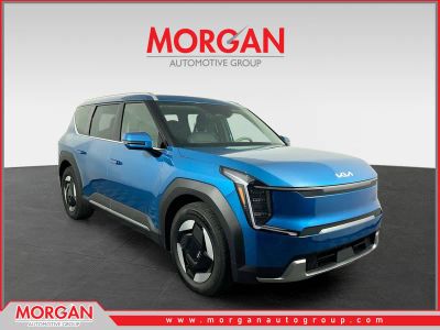 2026 Kia EV9 Wind in Ocean Blue — front three-quarter view