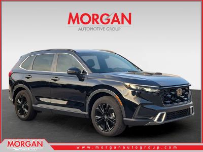 2023 Honda CR-V Hybrid Sport Touring in Crystal Black Pearl — front three-quarter view
