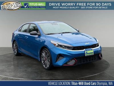 2023 Kia Forte GT in Sporty Blue — front three-quarter view