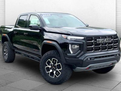 2026 GMC Canyon AT4X in Onyx Black — front three-quarter view