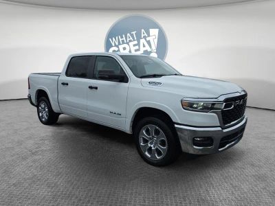 2026 RAM 1500 Big Horn/Lone Star in Bright White Clearcoat — front three-quarter view