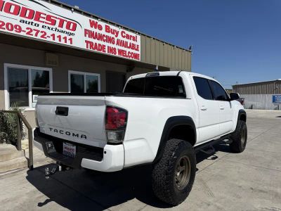 2018 Toyota Tacoma Double Cab — rear three-quarter view
