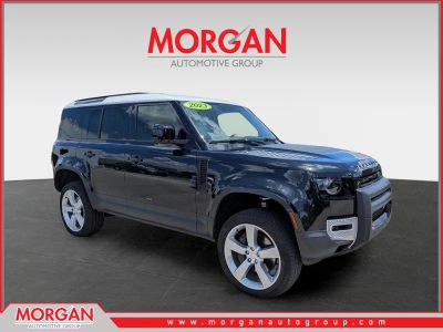 2023 Land Rover Defender SE in Santorini Black Metallic — front three-quarter view
