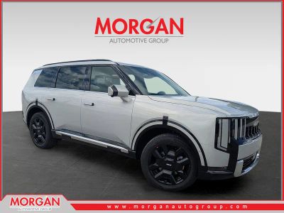 2027 Kia Telluride Hybrid SX in Ivory Silver — front three-quarter view