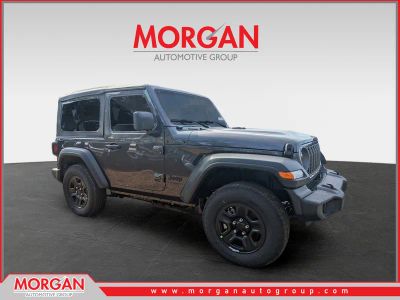 2026 Jeep Wrangler Sport in Gray — front three-quarter view