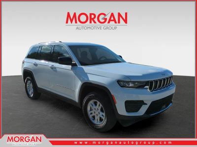 2025 Jeep Grand Cherokee Laredo in White — front three-quarter view