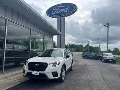 2023 Subaru Forester CVT in Crystal White Pearl — front three-quarter view