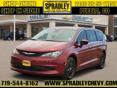 2023 Chrysler Voyager LX in Red — front three-quarter view