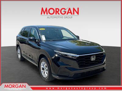 2025 Honda CR-V LX in Crystal Black Pearl — front three-quarter view