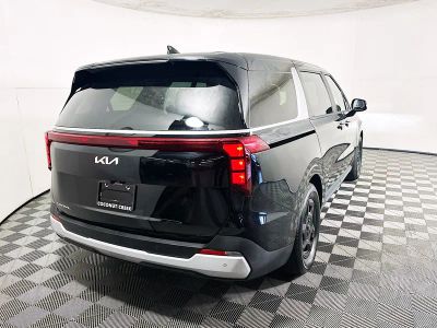 2025 Kia Carnival — rear three-quarter view