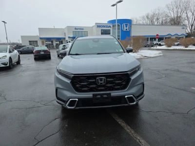 2023 Honda CR-V Hybrid Sport Touring — rear three-quarter view