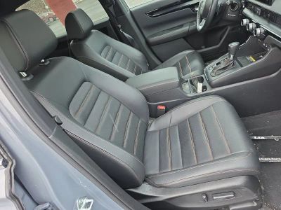 2023 Honda CR-V Hybrid Sport Touring RS6H9PKW — front three-quarter view