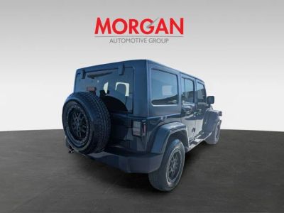 2017 Jeep Wrangler — rear three-quarter view