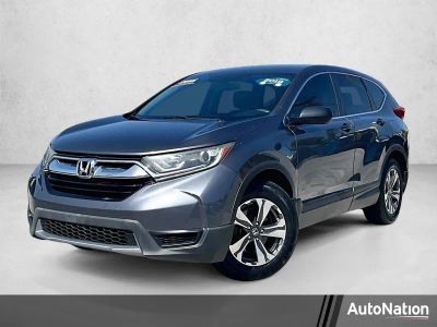 2019 Honda CR-V LX in Gray — front three-quarter view