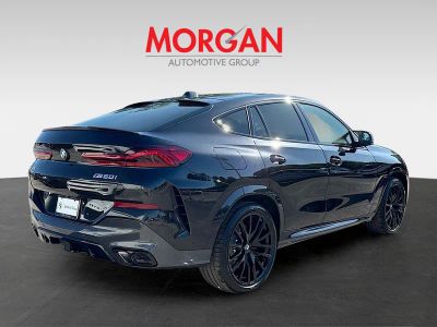 2027 BMW X6 — rear three-quarter view