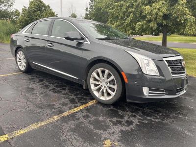 2016 Cadillac XTS Luxury Collection in Graphite Metallic — front three-quarter view