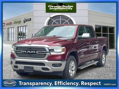 2022 RAM 1500 Laramie Crew Cab 4x4 5'7' Box in Delmonico Red Pearlcoat — front three-quarter view