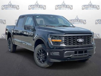 2026 Ford F-150 STX in Black — front three-quarter view