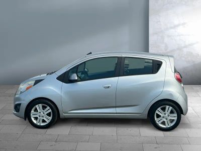 2014 Chevrolet Spark — rear three-quarter view