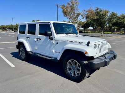 2015 Jeep Wrangler-Unlimited — rear three-quarter view