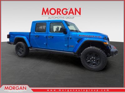 2022 Jeep Gladiator Mojave in Blue — front three-quarter view